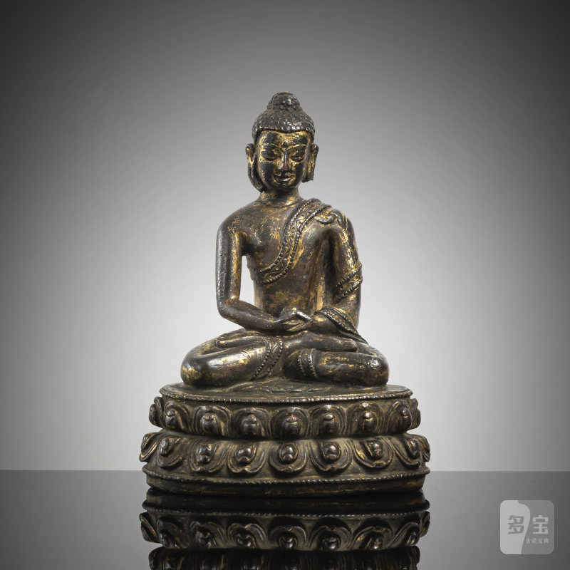 A GILT-COPPER FIGURE OF BUDDHA SHAKYAMUNI